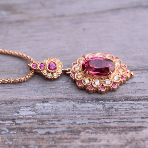 3.71-carat Mahenge spinel set into rose gold with peach diamonds, mahenge and Burma spinel.